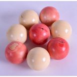 A COLLECTION OF EIGHT VICTORIAN CARVED IVORY SNOOKER BALLS. 415 grams. 3.5 cm wide. (8)