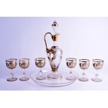 AN AUSTRIAN SECESSIONIST ART NOUVEAU GLASS DECANTER with six matching glasses and tray, overlaid