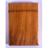 A VICTORIAN CARVED OLIVE WOOD CARD CASE of plain form. 8 cm x 11.25 cm.