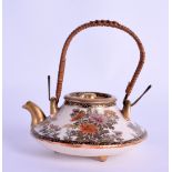 A LATE 19TH CENTURY JAPANESE MEIJI PERIOD SATSUMA TEAPOT AND COVER painted with floral sprays. 8.5