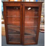 A LARGE ANTIQUE MAHOGANY GLASS FRONT DISPLAY CABINET.