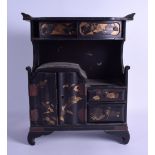 AN EARLY 20TH CENTURY JAPANESE MEIJI PERIOD BLACK LACQUER CABINET decorated with foliage and