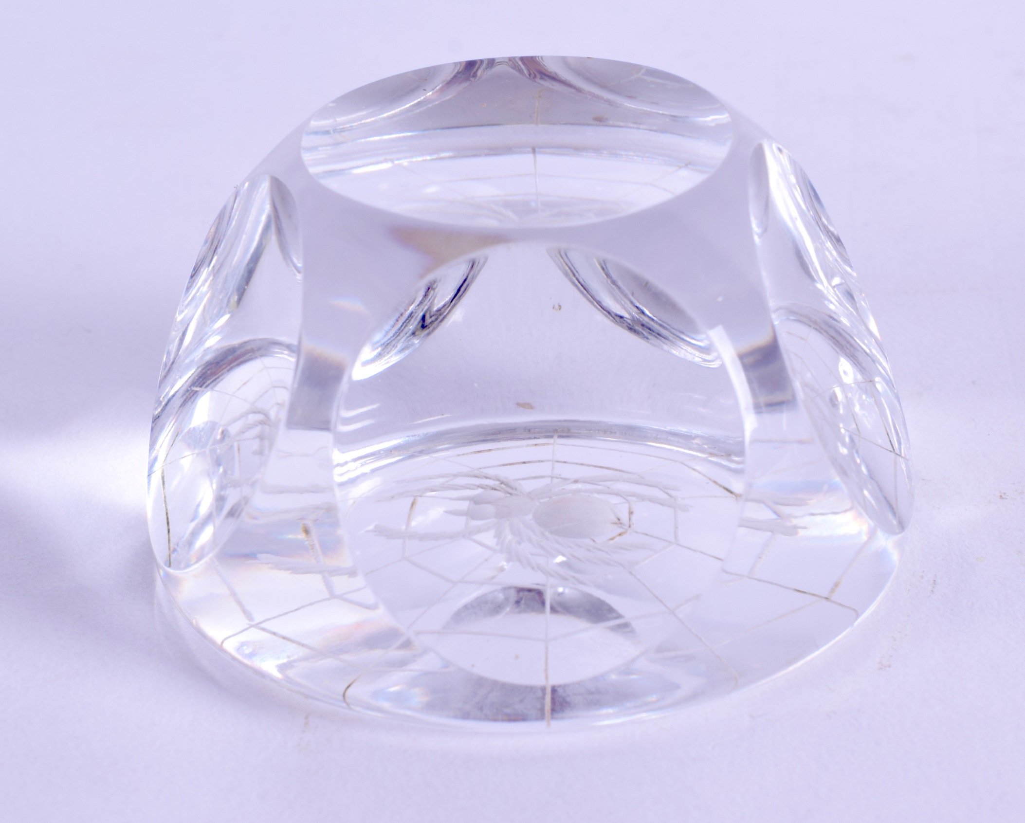 A ROYAL DOULTON 'SPIDER' CRYSTAL GLASS PAPERWEIGHT. 6 cm wide.
