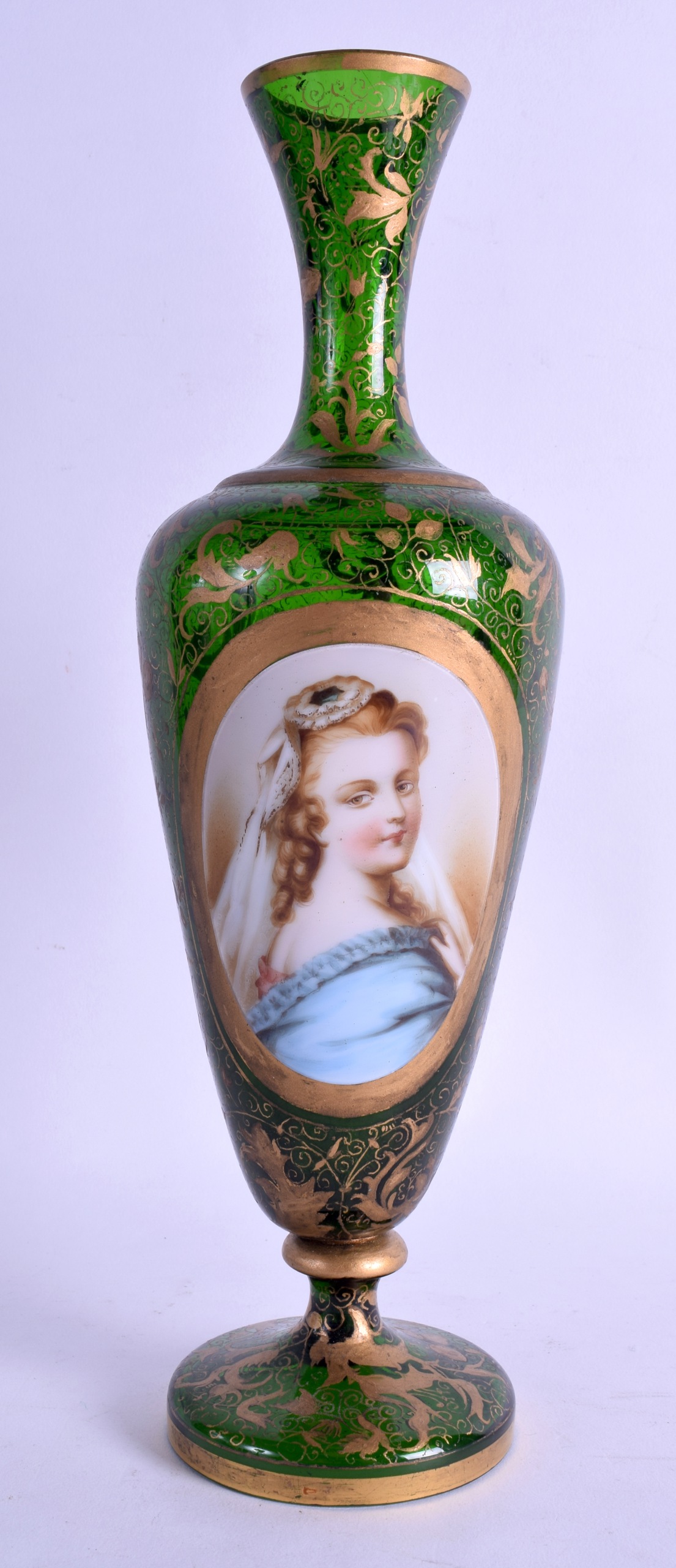 A 19TH CENTURY BOHEMIAN GREEN GLASS VASE painted with a female wearing a blue dress, within a