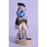 A 19TH CENTURY MEISSEN PORCELAIN FIGURE OF A MALE modelled wearing a blue coat upon a circular base.