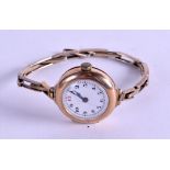 A VINTAGE 9CT GOLD CASED LADIES WRISTWATCH with yellow metal strap. 21.5 grams overall.