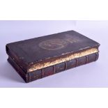 A RARE EARLY 19TH CENTURY REGENCY NOVELTY INKWELL in the form of an early book, with slide binding