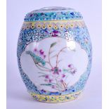 A CHINESE REPUBLICAN PERIOD FAMILLE ROSE JAR AND COVER painted with floral sprays. 12.5 cm high.