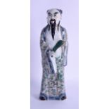 A 17TH/18TH CENTURY CHINESE FAMILLE VERTE PORCELAIN FIGURE OF AN IMMORTAL Kangxi, painted with birds