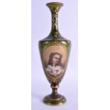 A 19TH CENTURY BOHEMIAN GREEN GLASS VASE painted with a female wearing a white dress with red