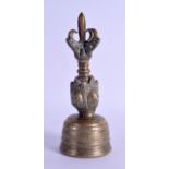 A GOOD 18TH/19TH CENTURY TIBETAN BRONZE PHURBA BELL decorated with mask heads and engraved with