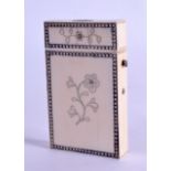 A GEORGE III CARVED IVORY PIQUE WORK CARD CASE decorated with stylised floral sprays. 5 cm x 8.75