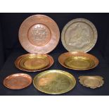 A GROUP OF NINE EASTERN BRASS & COPPER DISHES, of varying design and size, including Indian. (9)