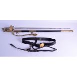 A 19TH CENTURY ENGLISH NAVAL SWORD with brass grip decorated with an anchor, together with a