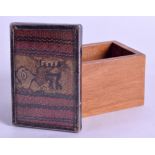 A SILVER MOUNTED CARVED HARDWOOD BOX the top inset with an early Egyptian or Koptic material