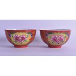 A PAIR OF CHINESE CORAL GROUND PORCELAIN BOWLS bearing Daoguang marks to base, painted with floral