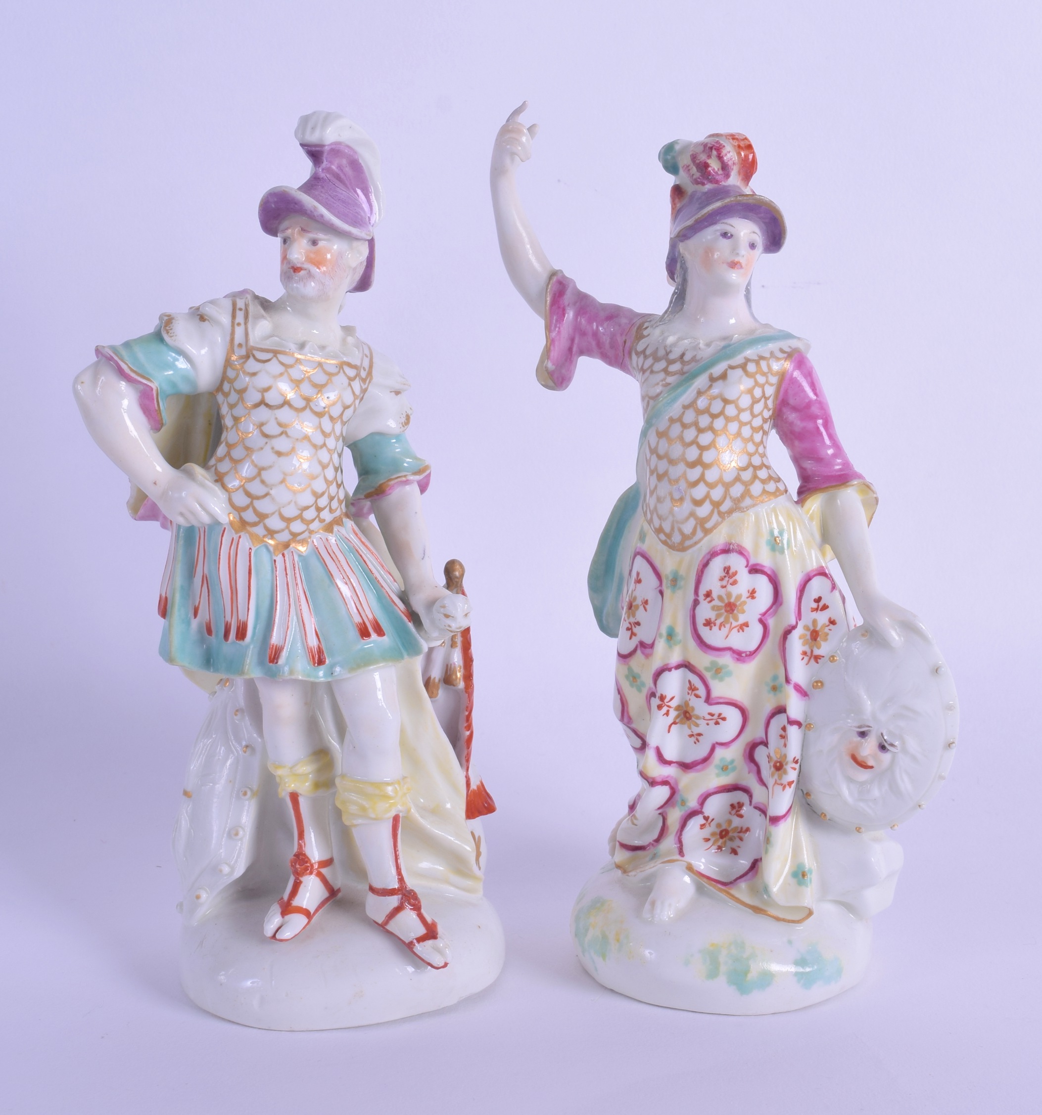 18th c. Derby pair of patch marked figures of Venus and Mars, he standing beside a flag, she holding
