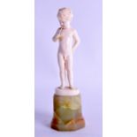 A LOVELY ART DECO CARVED IVORY FIGURE OF A YOUNG BOY by Ferdinand Preiss, modelled as a boy