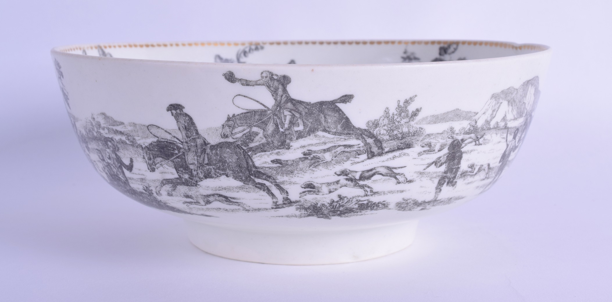 18th c. Worcester rare punch bowl printed by Robert Hancock with a continuous hunting scene. 21cm