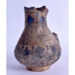 A PERSIAN NISHAPUR POTTERY JUG 10th to 12th Century, painted with blue motifs. 15 cm high.