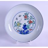 A CHINESE DOUCAI PORCELAIN DISH bearing Qianlong marks to base, painted with flowering rock. 20 cm