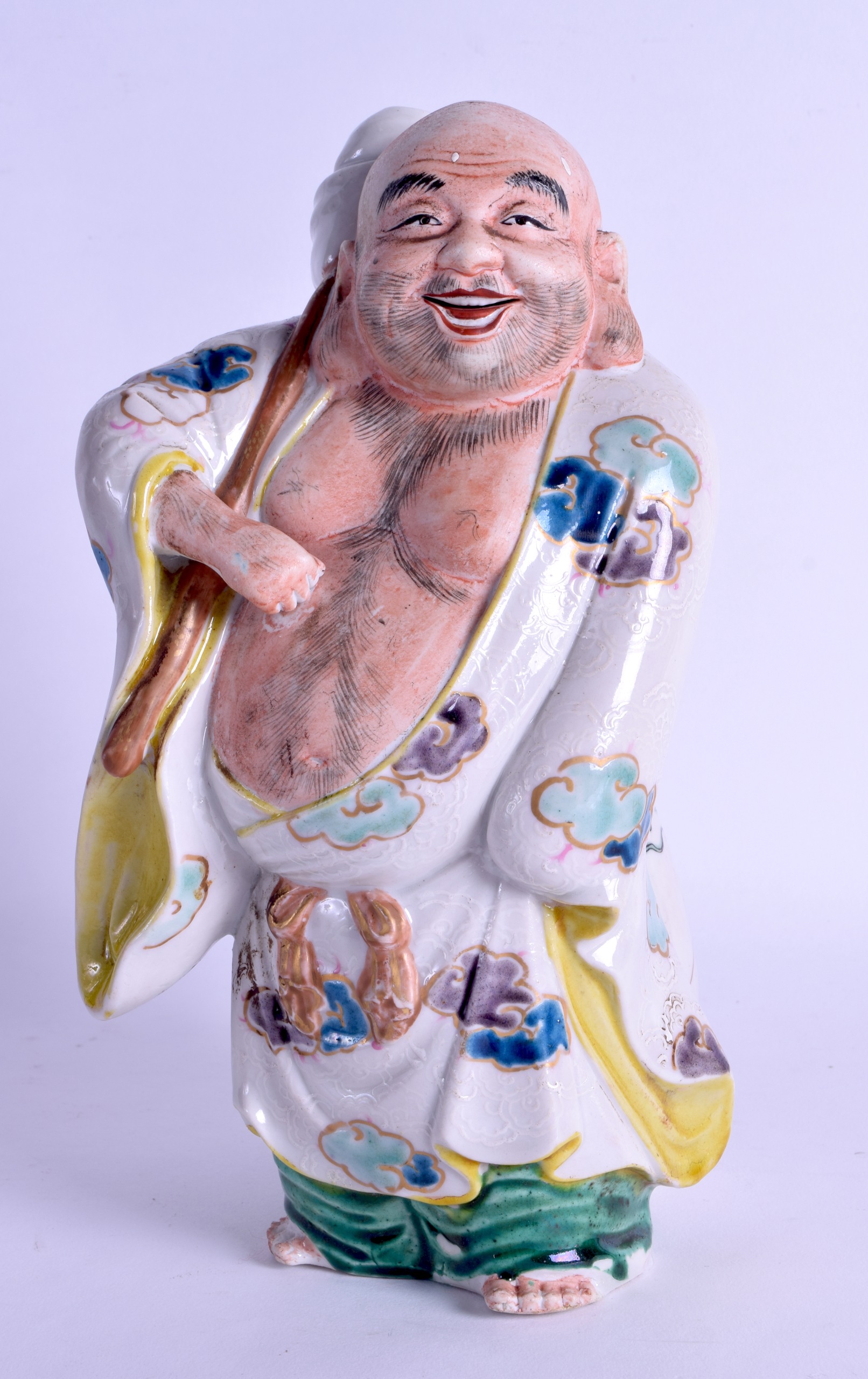 A 19TH CENTURY JAPANESE MEIJI PERIOD AO KUTANI POTTERY FIGURE depicting a standing buddha with his
