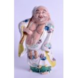 A 19TH CENTURY JAPANESE MEIJI PERIOD AO KUTANI POTTERY FIGURE depicting a standing buddha with his