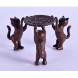 AN UNUSUAL CHINESE BRONZE FIGURE OF THREE CATS modelled peering into a fish bowl. 8 cm wide.