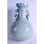 A CHINESE TWIN HANDLED BULBOUS CELADON VASE decorated with flowers and scrolling vines. 37.5 cm