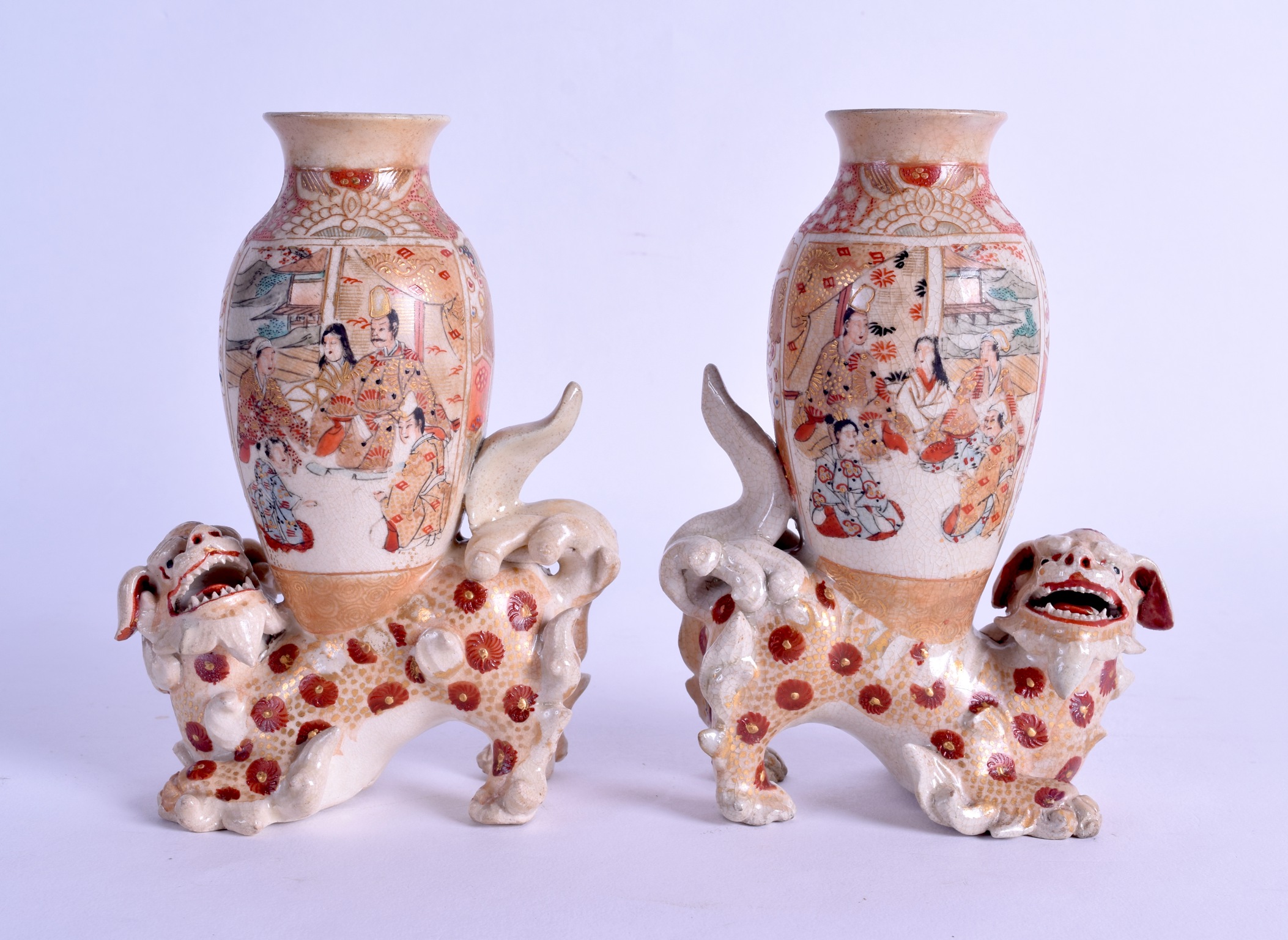 AN UNUSUAL PAIR OF LATE 19TH CENTURY JAPANESE MEIJI PERIOD SATSUMSA VASES modelled as buddhistic