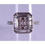 AN 18CT GOLD ART DECO STYLE BAGUETTE CUT DIAMOND RING.