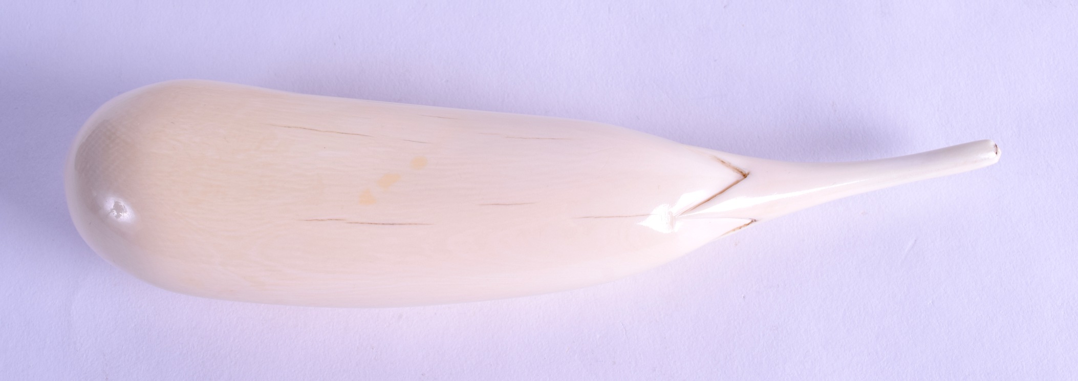A GOOD 19TH CENTURY JAPANESE MEIJI PERIOD CARVED IVORY AUBERGINE of naturalistic form. 19 cm long. - Image 2 of 2