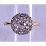 AN 18CT GOLD AND MULTI STONE DIAMOND FANCY RING.