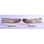 A PAIR OF EARLY 20TH CENTURY CHINESE SILK WORK SHOES decorated with foliage. 22 cm wide.