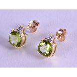 A PAIR OF 9CT GOLD DIAMOND AND PERIDOT EARRINGS.