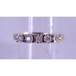 A 9CT GOLD FIVE STONE DIAMOND RING.