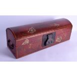 A CHINESE RED LACQUERED RECTANGULAR DOMED CASKET decorated with flowers and vines. 48 cm long.