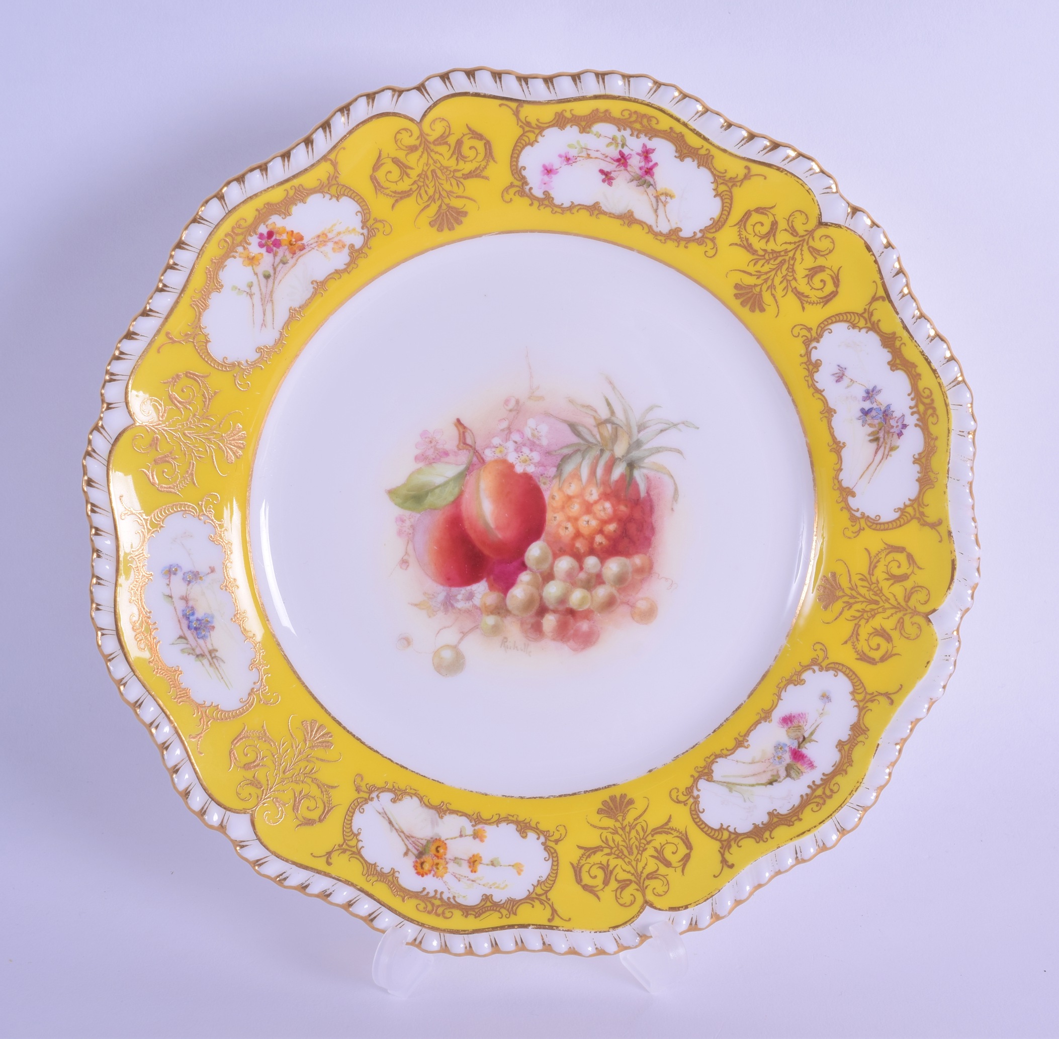 Royal Worcester fine plate painted with fruit unusually including a pineapple, signed Ricketts under