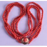 AN 18CT GOLD MOUNTED CARVED RED CORAL NECKLACE. 37 grams. 44 cm long.