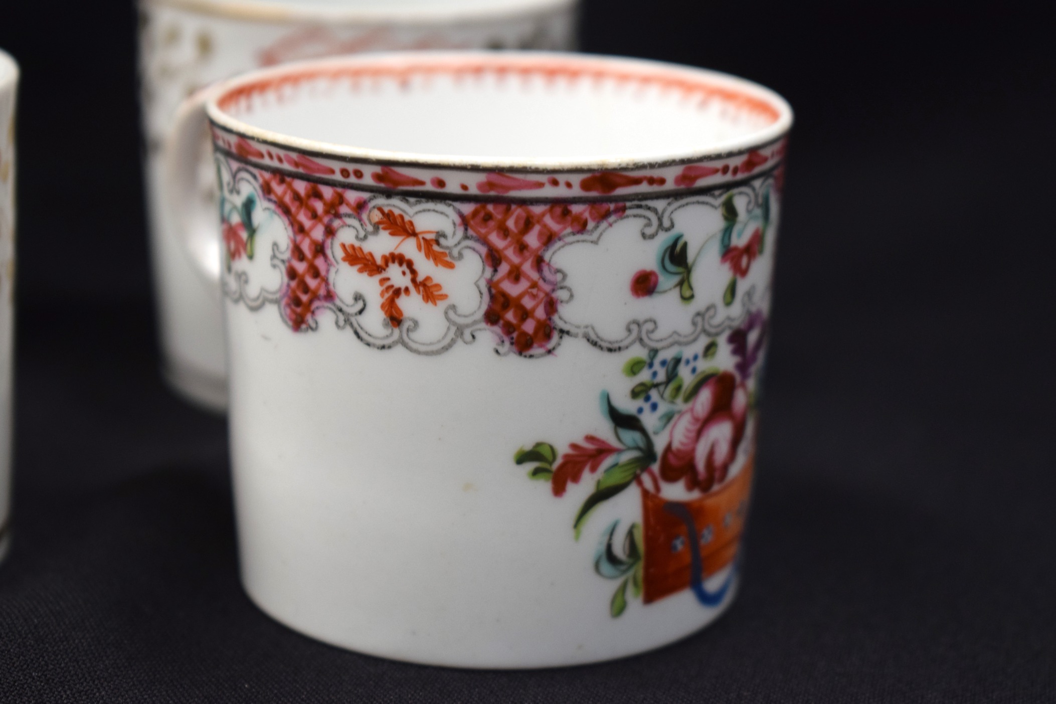 A GROUP OF NINE GOOD NEW HALL PORCELAIN COFFEE CUPS, of varying pattern. - Image 4 of 4