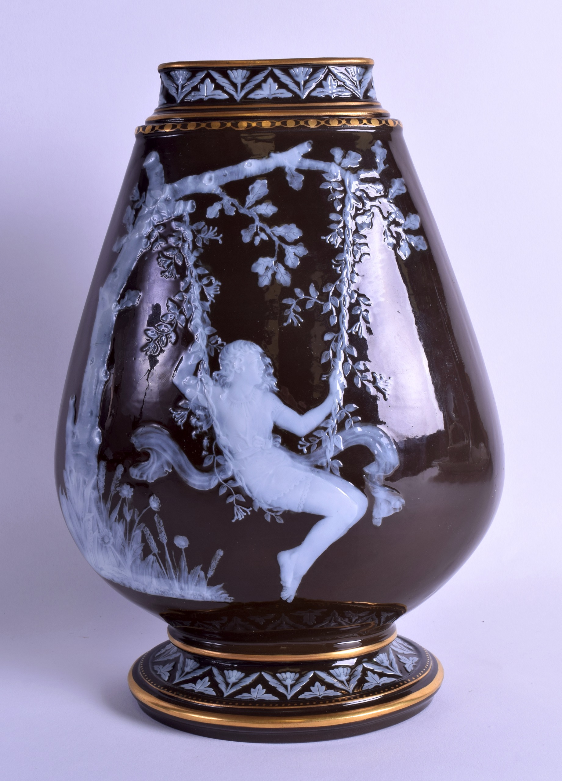 A LOVELY 19TH CENTURY EUROPEAN PATE SUR PATE POTTERY VASE depicting a female modelled swinging