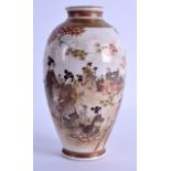 A LATE 19TH CENTURY JAPANESE MEIJI PERIOD SATSUMA VASE painted with geisha within landscapes. 18.5