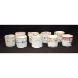 A GROUP OF NINE GOOD NEW HALL PORCELAIN COFFEE CUPS, of varying pattern.