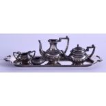 AN EDWARDIAN MINIATURE SILVER TEASET ON TRAY. London 1905. (5)