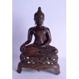 A LARGE 19TH CENTURY SOUTH EAST ASIAN BRONZE BUDDHA modelled upon an open work base. 41 cm high.