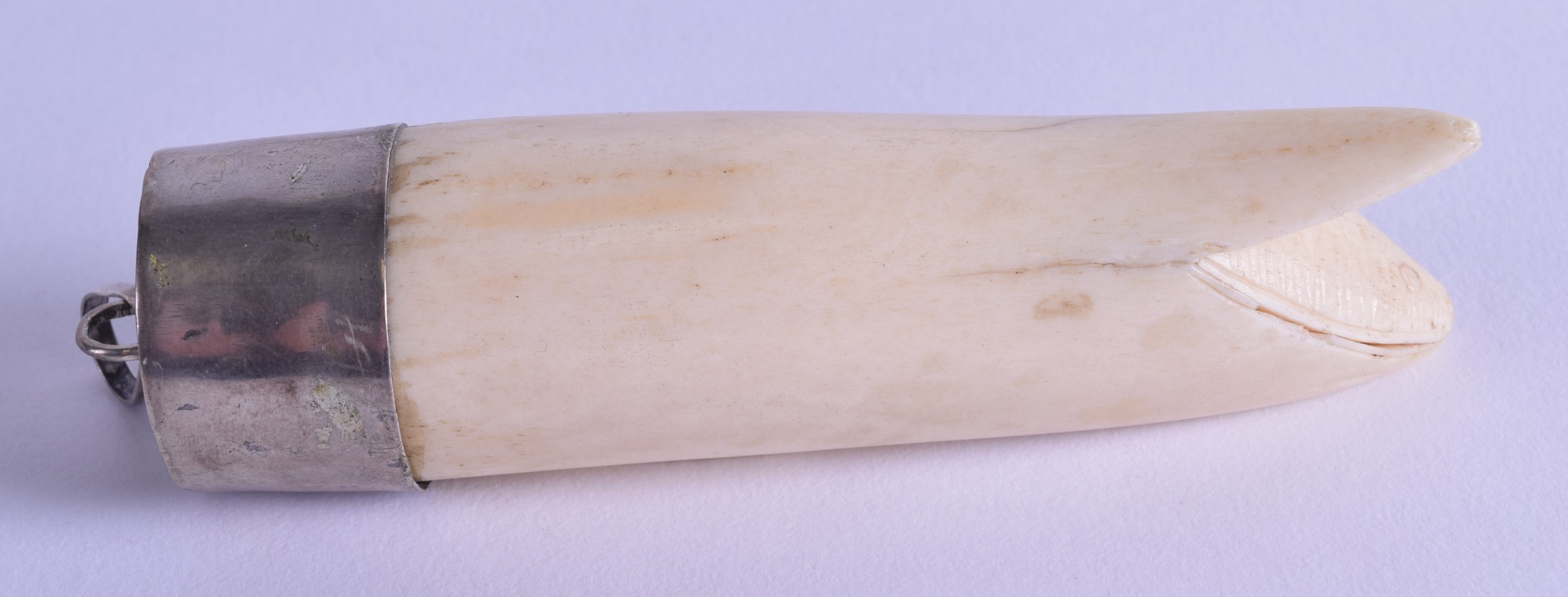 A 19TH CENTURY JAPANESE MEIJI PERIOD CARVED IVORY BANANA PENDANT with white metal mounts. 10.25 cm - Image 2 of 3