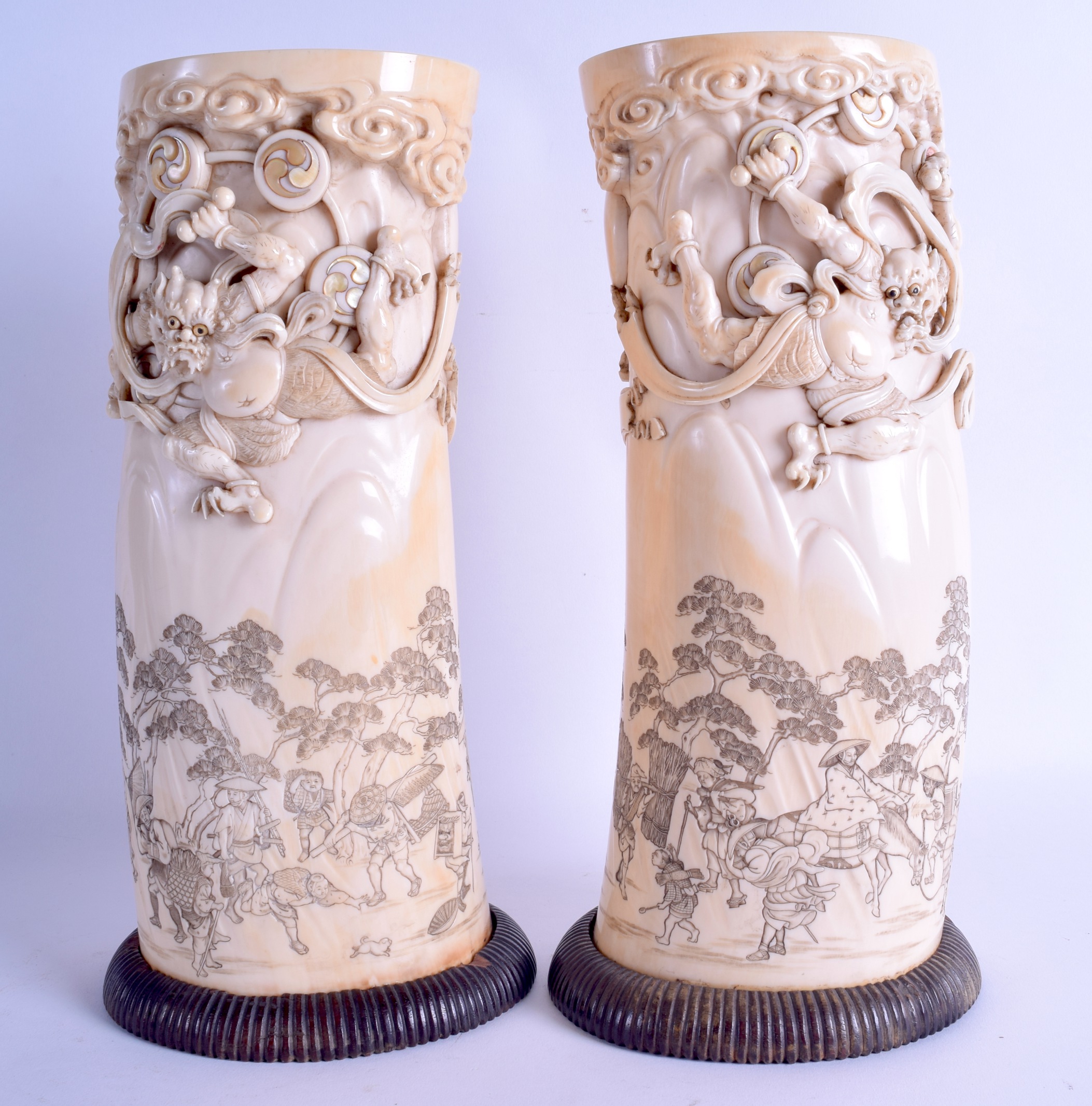 A FINE LARGE PAIR OF 19TH CENTURY JAPANESE MEIJI PERIOD CARVED IVORY TUSK VASES decorated in