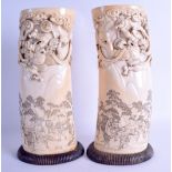 A FINE LARGE PAIR OF 19TH CENTURY JAPANESE MEIJI PERIOD CARVED IVORY TUSK VASES decorated in