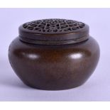 A MINIATURE BRONZE CENSER AND COVER. 4.25 cm diameter.