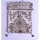 AN ANTIQUE MIDDLE EASTERN OTTOMAN TUGRA TYPE SILVER WIRE PURSE decorated with floral vines and